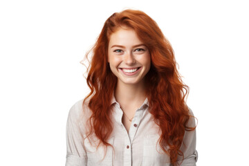 A young woman with long wavy red hair wearing a casual outfit and smiling at the camera isolated on white background