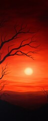 Fototapeta premium A stunning sunset with vibrant orange hues and silhouetted branches, creating a tranquil and captivating atmosphere.