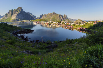 Amazing view on village accross the fjord in Lofoten. Mountain in background. Norway