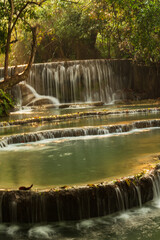 Cascading pools at Kuang Xi Waterfall near Luang Prabang, Laos - Beautiful turquoise blue waterfalls in Asia