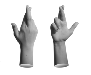 Finger crossed, lier gesture. Isolated hand, superstition sign, lucky symbol of hope, white background.