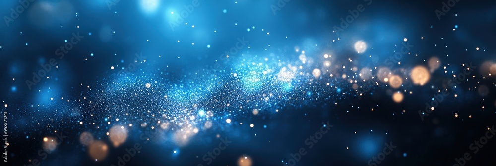 Aufkleber bright sparkling particles on a colorful blue background with depth of field effect
