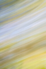 Abstract blurred image with diagonal lines of different colors.