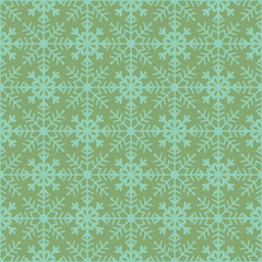 Beautiful monochrome Christmas seamless vector snowflake texture on green background. A classical seasonal pattern for wrapping paper, greeting cards, invitations, gift boxes and web background.
