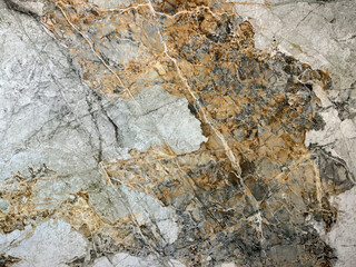 Natural dark grey emperador marble texture with black and golden veinings. Grey and gold natural marble stone, Seamless background texture.