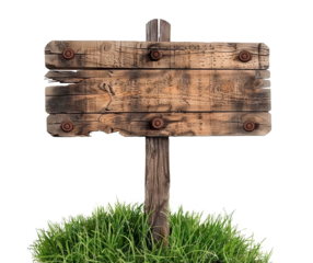 Weathered wooden signboard in grass, cut out
