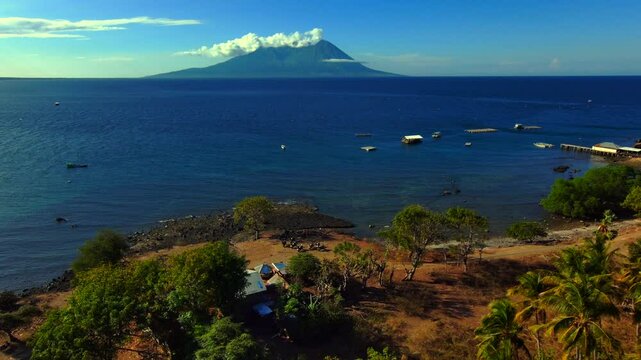 volcano  mountain sea ocean sky
