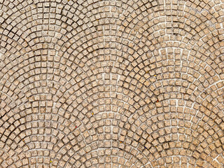 Curved Red Paving stone slabs in arched or curved fan position suitable for outdoor pavement or sidewalk base floor material. Fan Shape paving stone natural seamless texture.