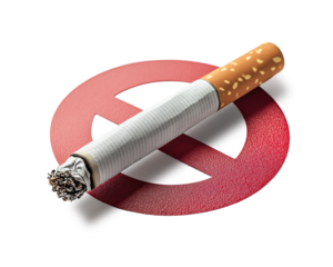 A cigarette lying on top of a red 'no smoking' sign, symbolizing the ban and discouragement of smoking
