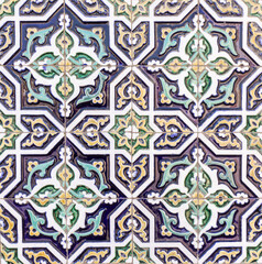ceramic Uzbek mosaic with green, blue and yellow traditional oriental Arabic Islamic pattern decorated with ornament background