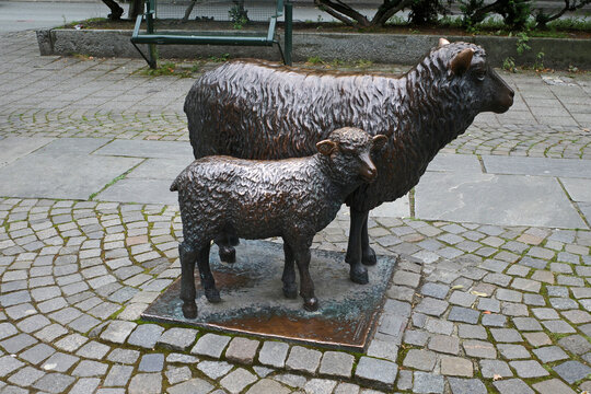 Stavanger, Norway - August 5 2024 Sculpture "Sau og lam" sheep and lamb by the artist Svein Magnus H&aring;vardstein in downtown 
