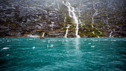 Chile, Tierra del Fuego, Alakaluf Fjord
with suggestive waterfalls