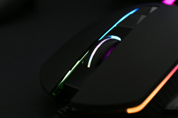 Computer mouse on black background, closeup view