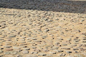 Creative background. Old cobblestone road background