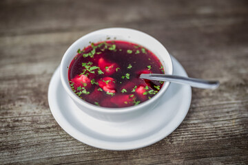 Traditional soup - beetroot borscht with meat dumplings.