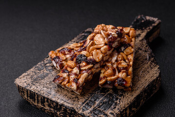 Delicious sweet nutrition bars with nuts, dried berries gluten free