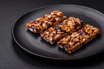Delicious sweet nutrition bars with nuts, dried berries gluten free