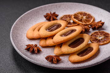 Delicious sweet crispy cookies with chocolate filling in the center