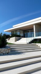 Fototapeta premium Modern House With White Stone Stairs and Blue Sky