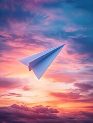 Paper Airplane Soaring Against a Vibrant Sunset Sky Symbolizing Dreams and Freedom