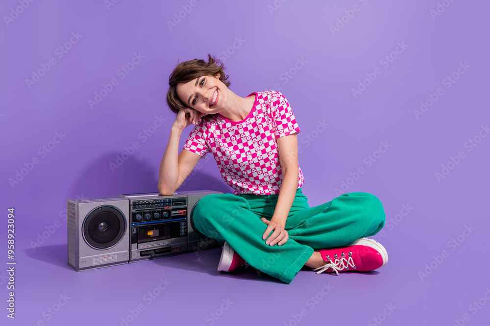 Poster Full size photo of gorgeous woman dressed print t-shirt lay hand on boombox enjoy retro playlist isolated on violet color background