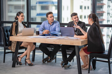 Portrait of businesspeople meeting to be discussing business plan