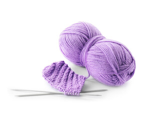 Skein of violet yarn, knitted fabric and needles isolated on white