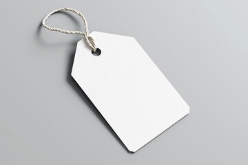 White empty tag for the price tag with a garter on a gray background, layout design template