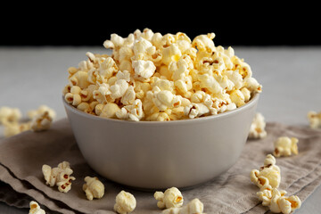 Homemade Salty Popcorn in a Bowl, side view.
