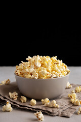 Homemade Salty Popcorn in a Bowl, side view.