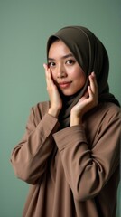 Hijabi Woman with Hands on Cheeks