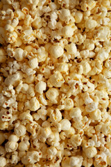 Homemade Salty Popcorn, top view. Flat lay, overhead, from above.
