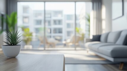A modern living room with a cozy atmosphere, featuring a plant and large windows that bring in natural light.
