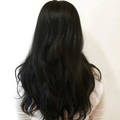 Fototapeta premium Natural Wavy Black Hair Styled with Premium Hair Dye