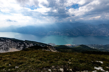 hike on the Monte Baldo massif with Lake Garda in the background on the border between the Veneto and Trentino Alto Adige regions, Italy