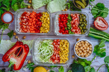 different vegetables cut in a bowl. Colorful shades. cabbage, peppers, onion, corn, tomato, pickle.
