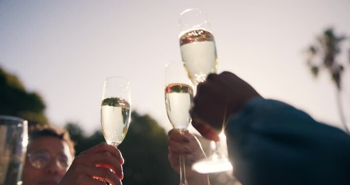 Party, friends and hands toast with champagne, having fun and bonding at sunset. Bellow, group and people cheers with wine glass, alcohol and drink for celebration relax on holiday or summer vacation