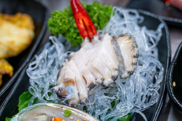 Korean seafood dishes. abalone sashimi