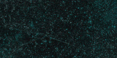 Dark cyan color scattered grunge texture on isolated dark background. Jade colored dark distressed turquoise grunge texture on a dark background.