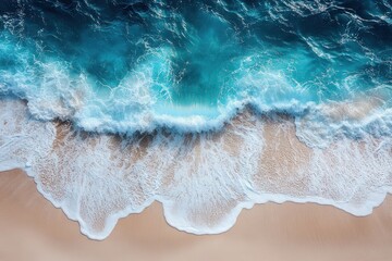 Aerial View of Turquoise Ocean Waves Crashing on Sandy Beach