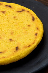 Delicious just grilled yellow corn hand made arepa.