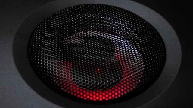 Closeup at moving sub-woofer. Speaker part music.