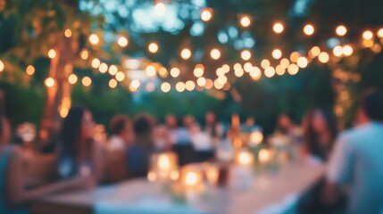 Blurred outdoor party with string lights and candlelit tables in a garden setting