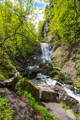 View of the waterfall in North Caucasus mountains