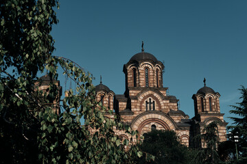 St. Mark's Temple Orthodox Church located in the Tasmajdan park. Belgrade, Serbia - 08.30.2024. Summertime in popular touristic place.