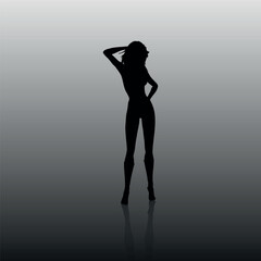 Black silhouette of a sexy girl with a shadow. Vector on a gray background