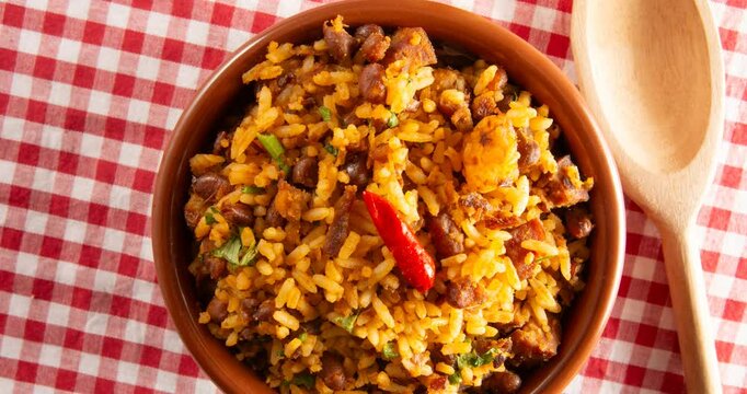 Baiao de dois a brazilian food with beans, rice, meat and rennet cheese, typical northeastern food
