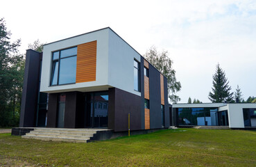 Villa construction. Prefab house under construction. Suburban house Construction. Prefabricated...
