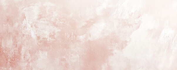 Fototapeta premium A light blush-colored surface with a delicate, grainy texture. The soft pastel hue and subtle texture add a gentle and romantic feel to the background.
