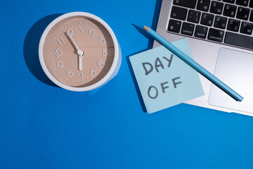Day off - workplace message in the office. Concept of absence from work and day off